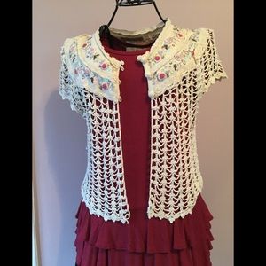 Amazingly feminine Vest/shrug.
